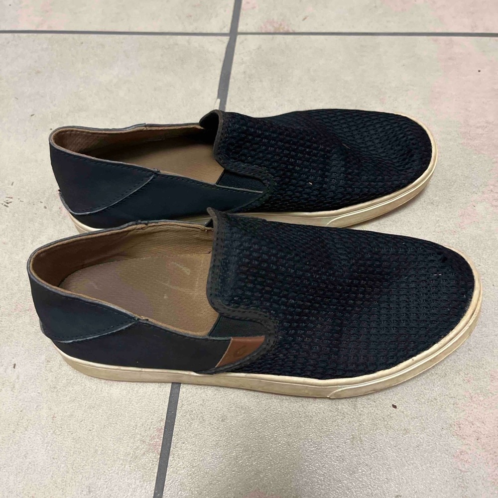 Olukai women’s Black Slip-On Shoes